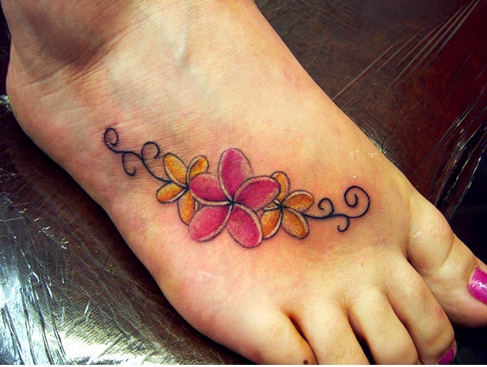 Pink And Yellow Flower Tattoo on Girl Right Foot