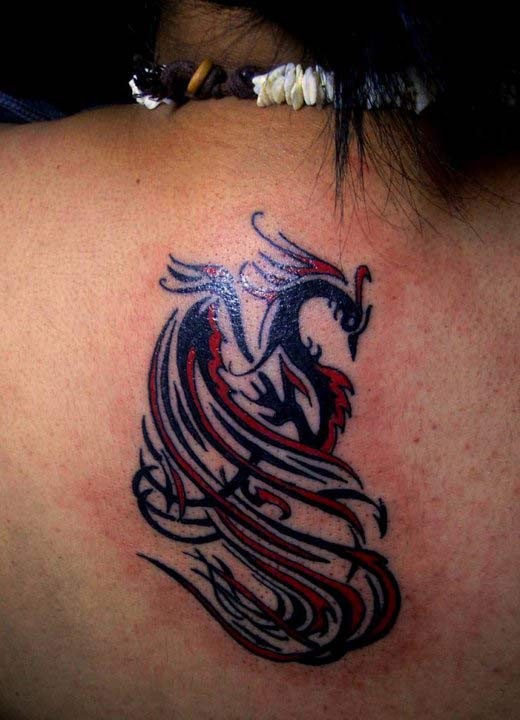 Red And Black Tribal Phoenix Tattoo On Upper Back