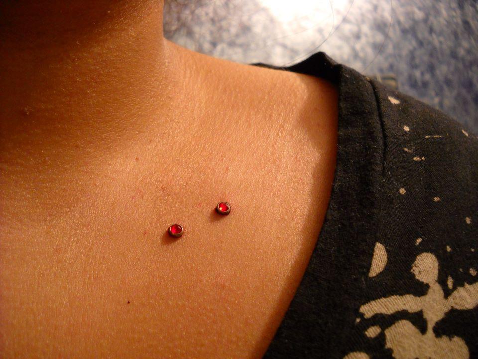 Red Microdermal Clavicle Piercing