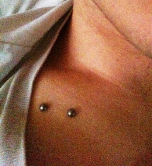 Right Clavicle Piercing With Silver Studs