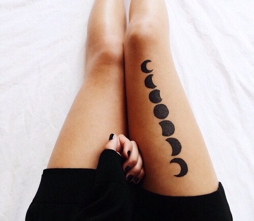 Silhouette Phases Of The Moon Tattoo On Girl Right Thigh