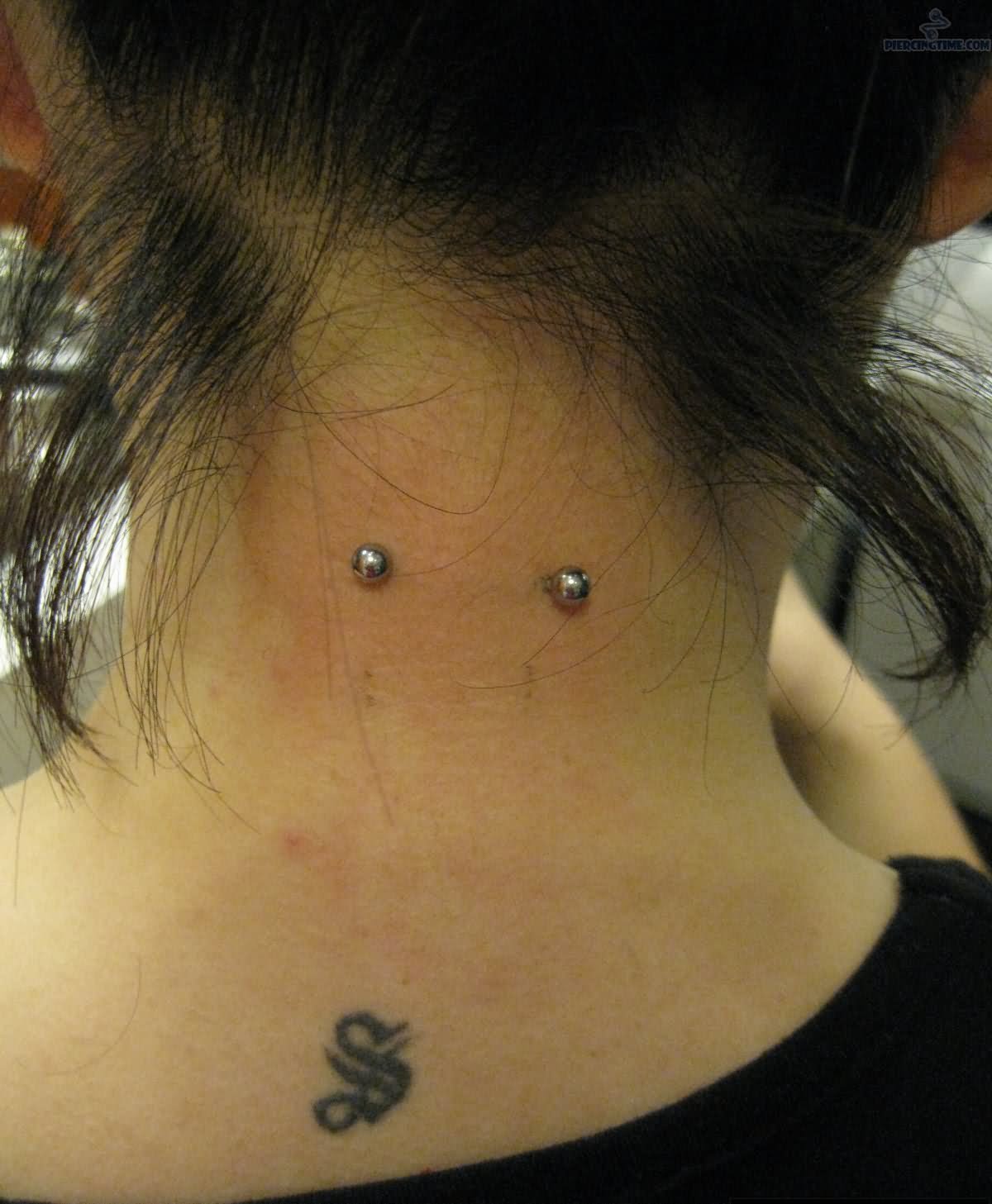 Silver Barbell Back Neck Piercing Picture For Girls