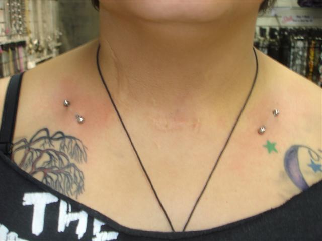 Silver Barbell Clavicle Piercing