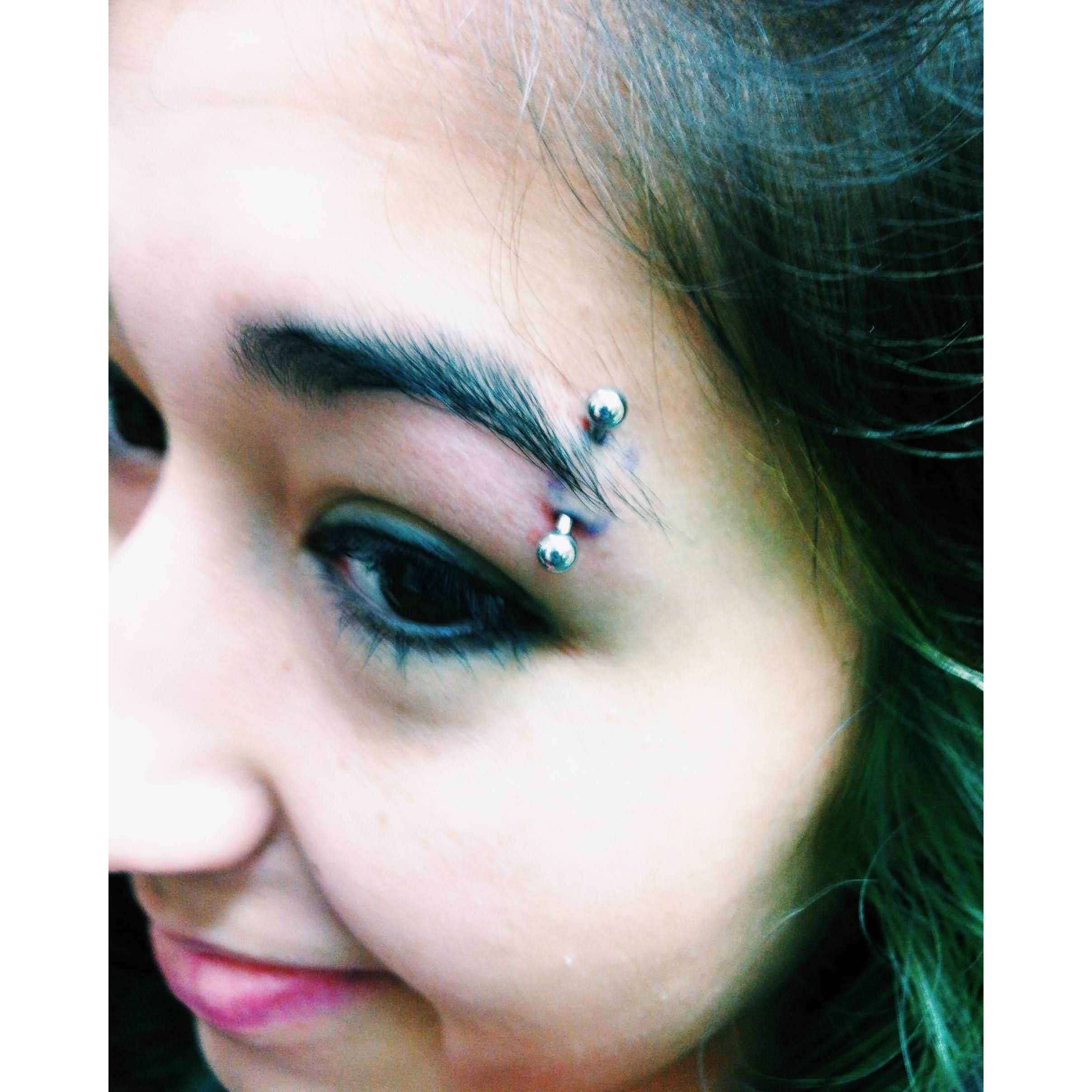 Silver Barbell Eyebrow Piercing For Girls
