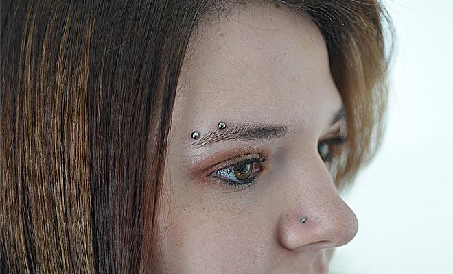 Silver Barbell Eyebrow Piercing Idea For Young Girls