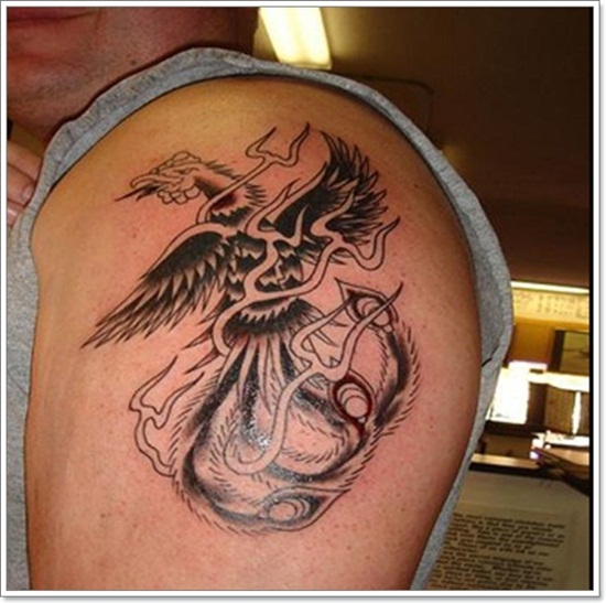 Simple Black Ink Phoenix Tattoo On Man Left Shoulder