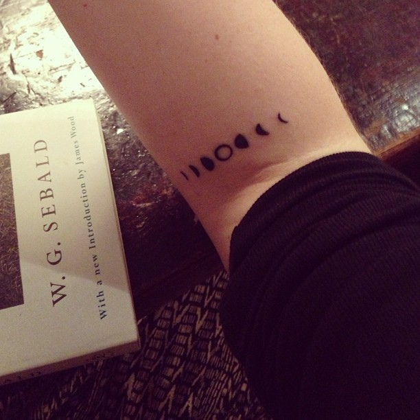 Simple Black Phases Of The Moon Tattoo On Right Arm