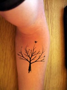 Simple Black Tree Of Life Tattoo On Forearm