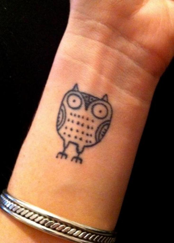 Simple Small Owl Tattoo On Wrist