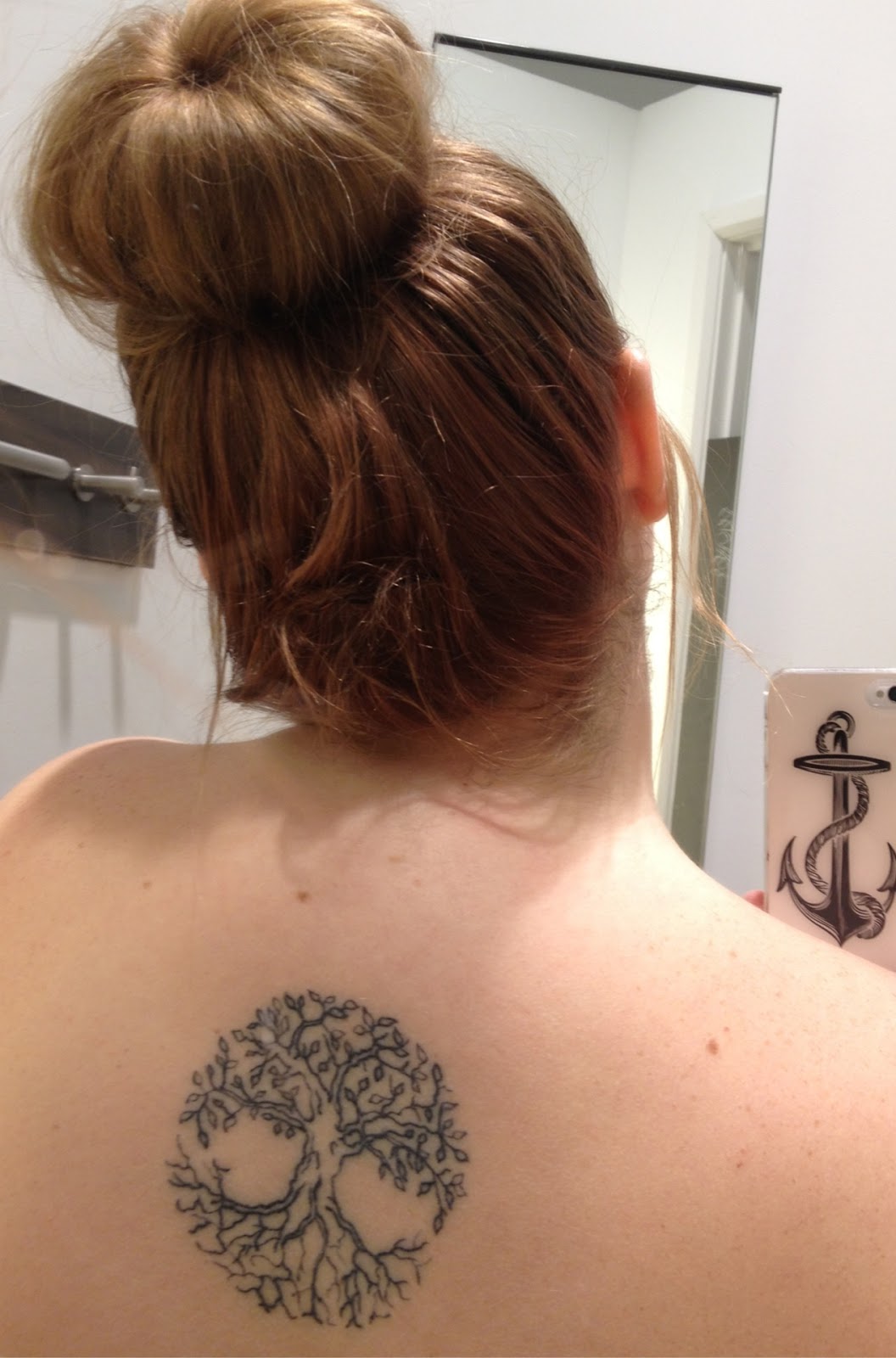 Simple Small Tree Of Life Tattoo On Girl Upper Back