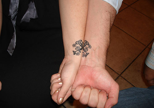 Small Black Celtic Tree Of Life Tattoo On Couple Wrist By Monica And Joe