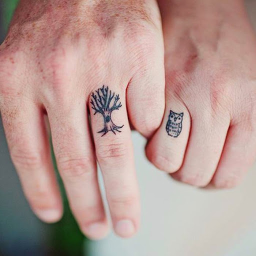 Small Owl And Tree Tattoo On Couple Finger