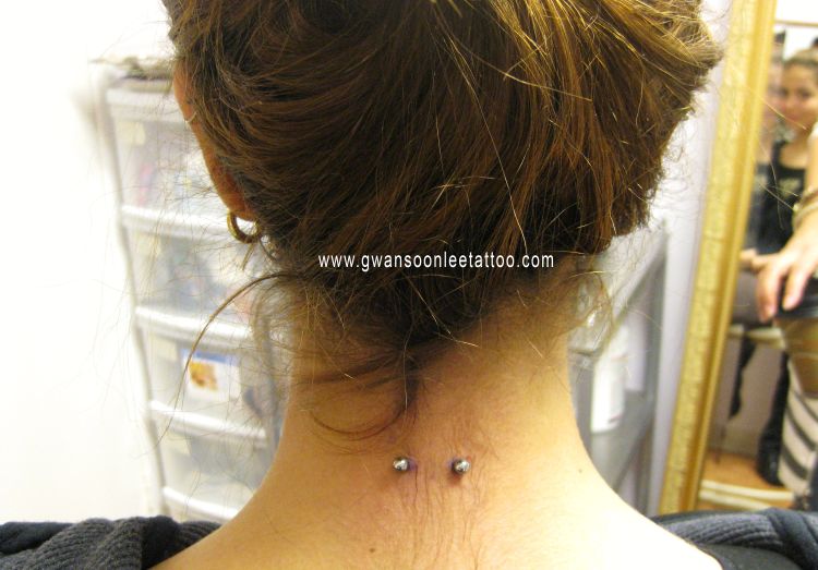 Small Silver Barbell Back Neck Piercing