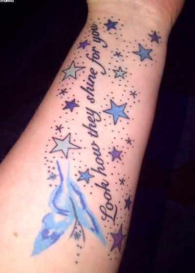 Stars and Butterfly Tattoo On Left Wrist