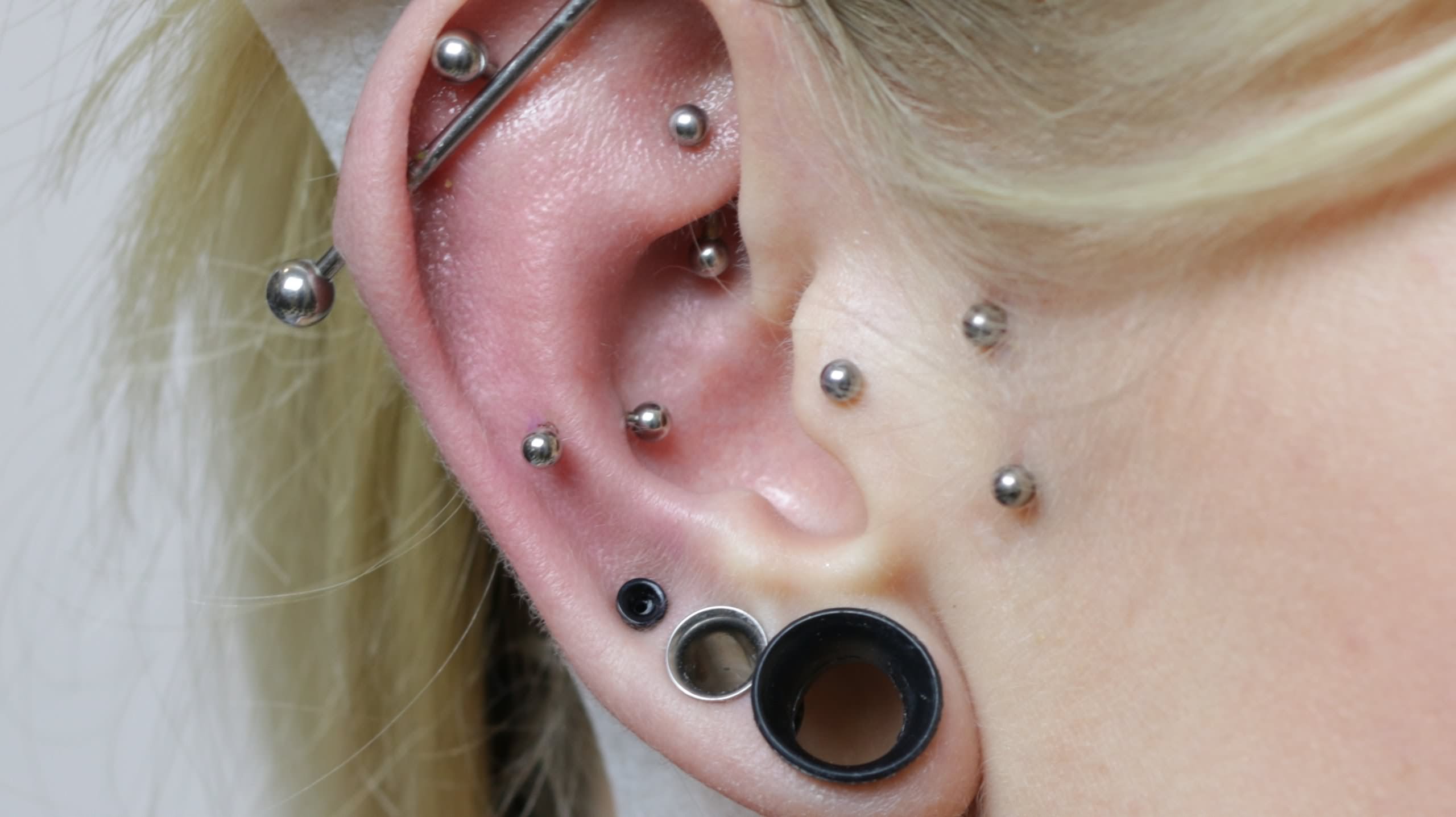 Ear Stretching And Snug Piercing For Girls