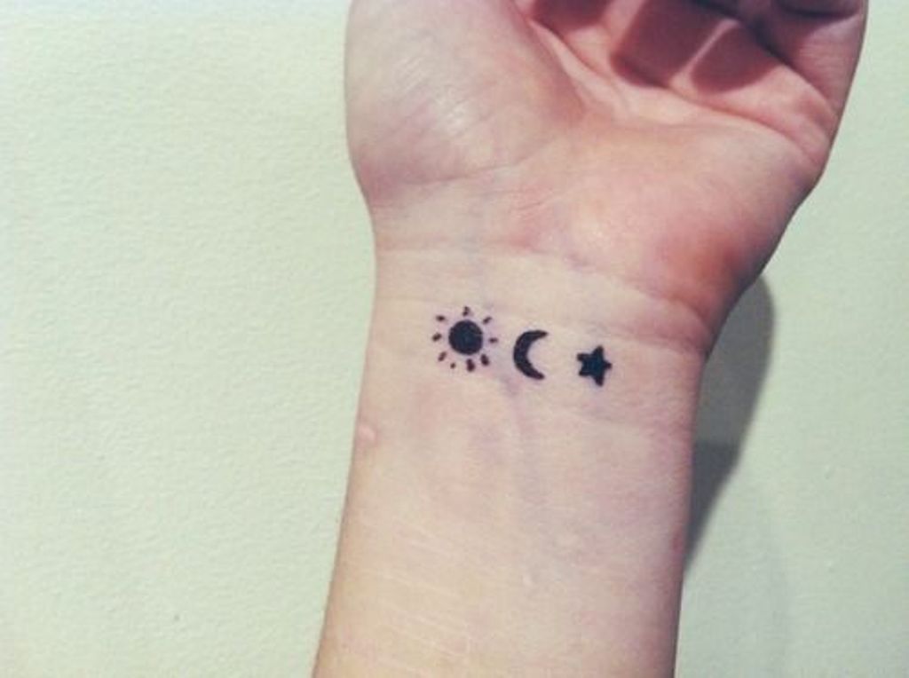 Sun Moon And Star Tattoo On Left Wrist