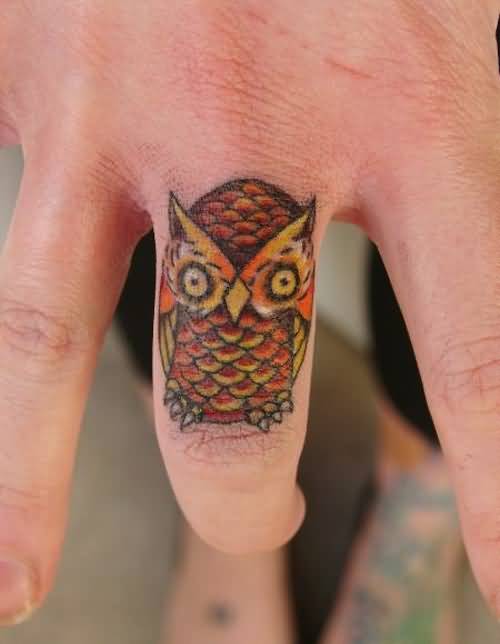 Traditional Baby Owl Tattoo On Finger