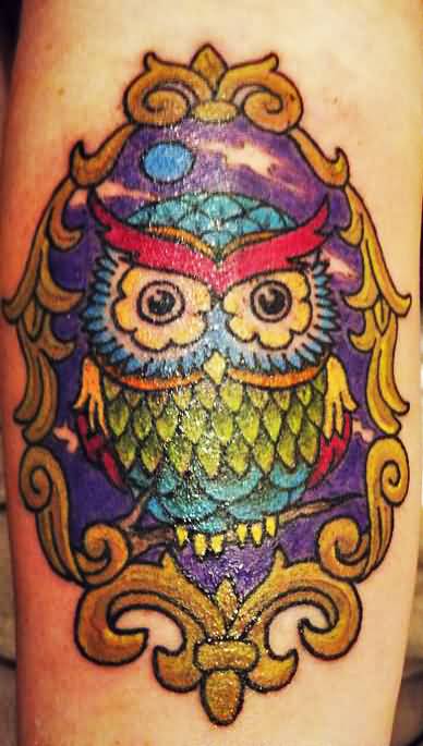 Traditional Colorful Baby Owl In Frame Tattoo Design For Forearm By Kyle Hickman