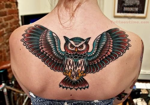 Traditional Colorful Flying Owl Tattoo On Girl Upper Back
