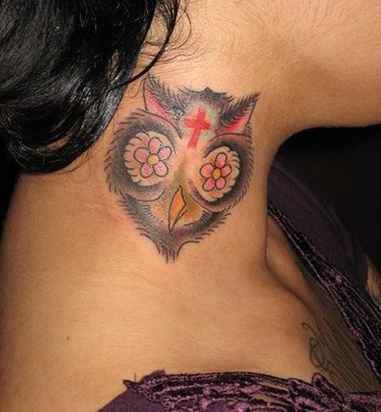 Traditional Owl Face Tattoo On Girl Side Neck