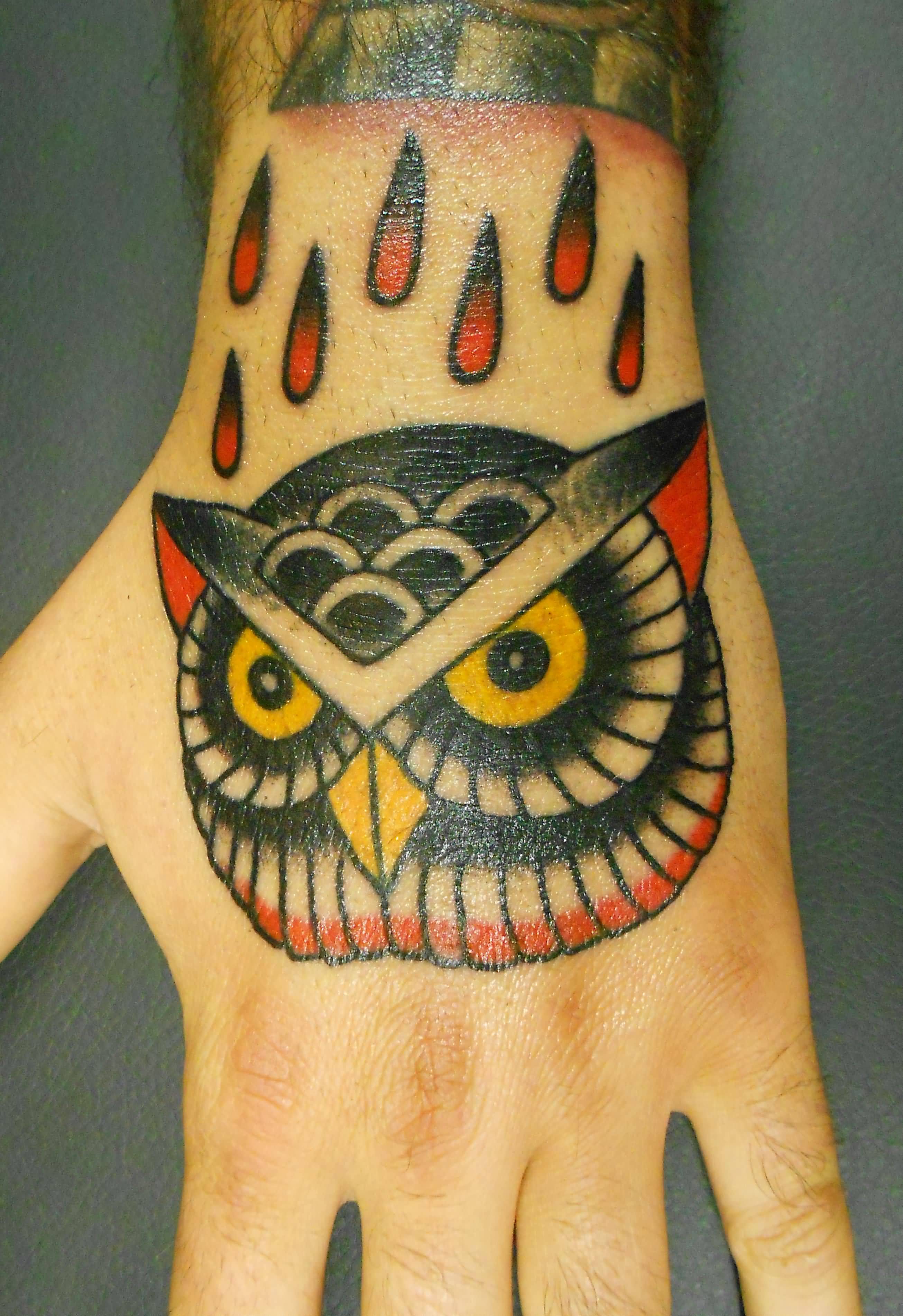 Traditional Owl Head Tattoo On Left Hand