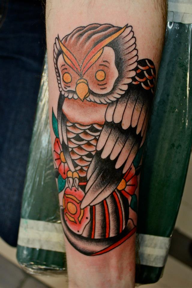 Traditional Owl With Flowers Tattoo On Forearm