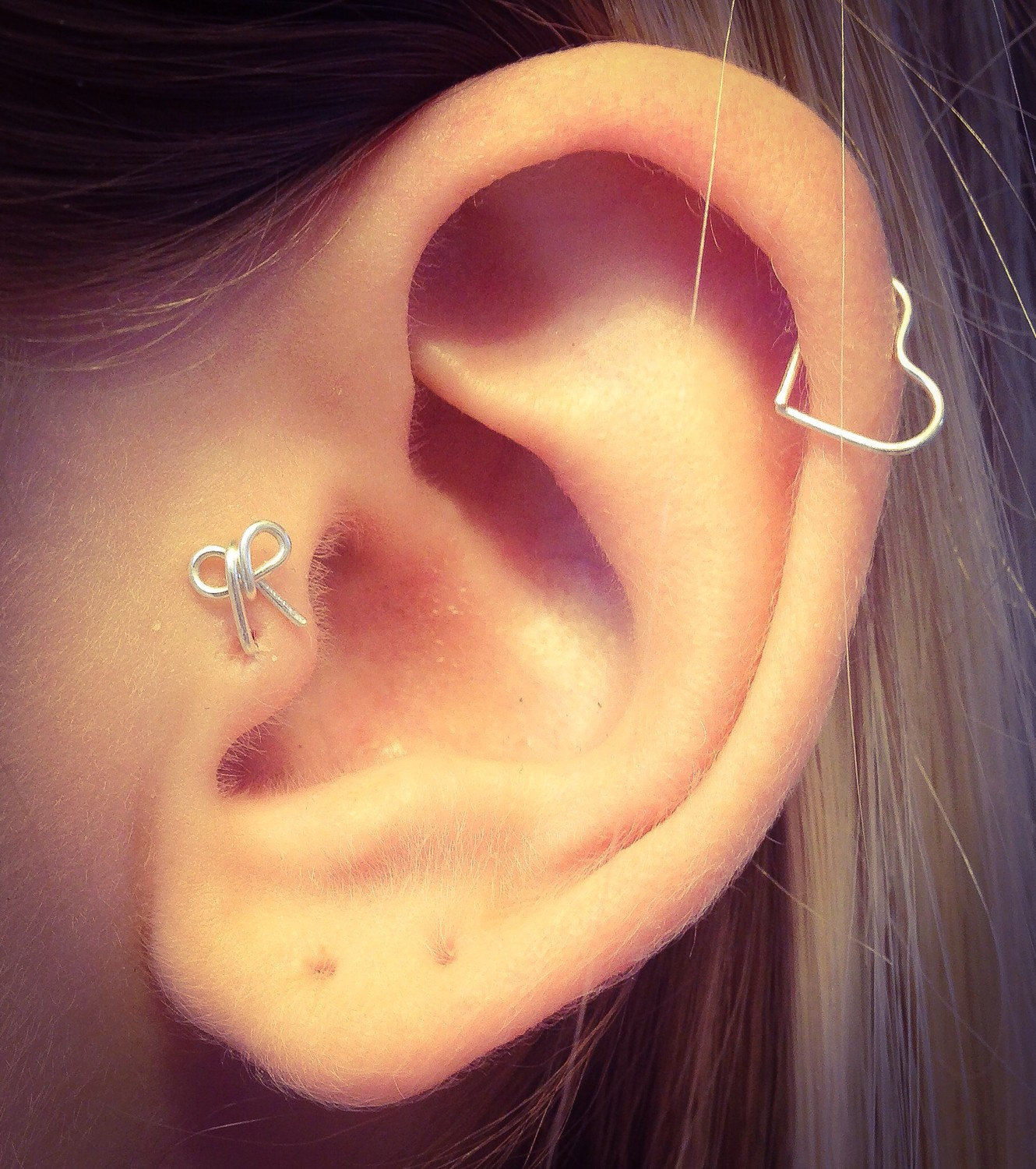 Tragus Piercing With Bow Stud