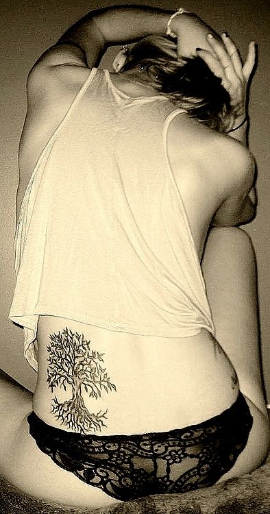 Tree Of Life Tattoo On Girl Lower Back