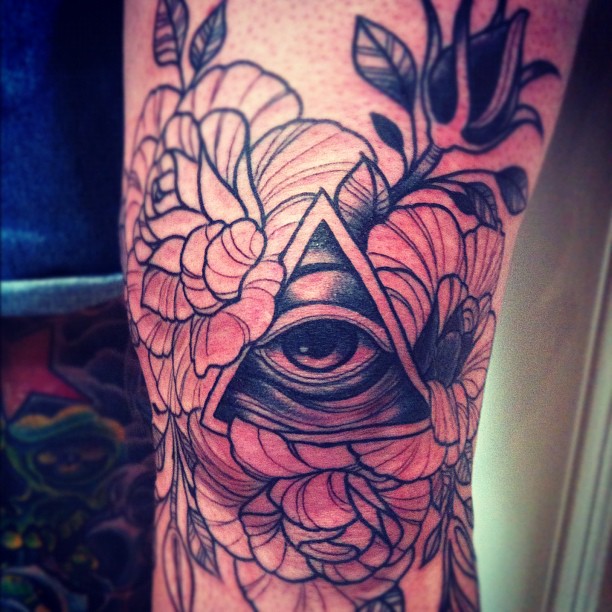 Triangle Eye With Flowers Tattoo On Knee