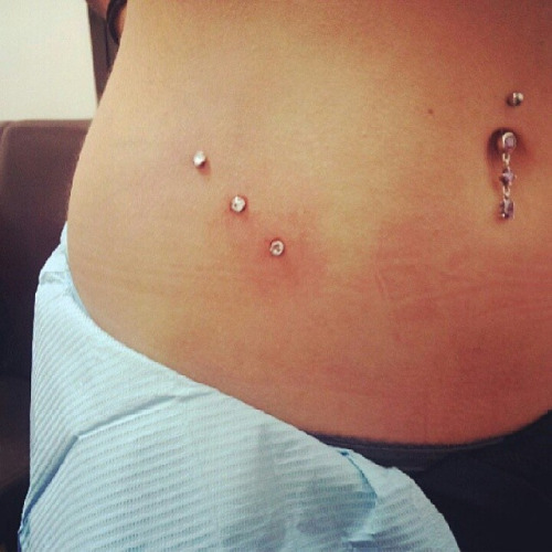 Triple Anchors Hip Piercing Pictures