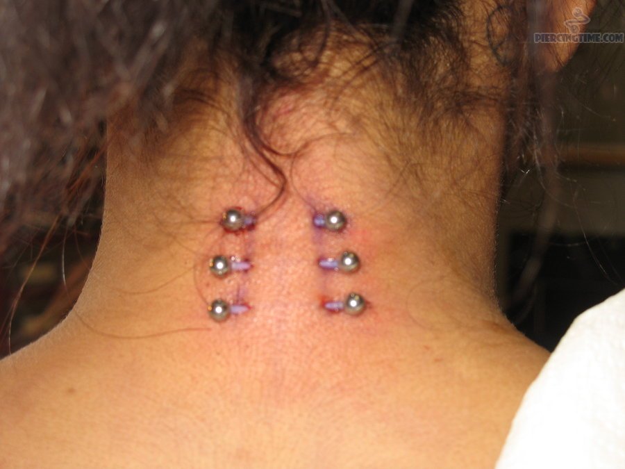 Triple Back Neck Piercing With Silver Barbells