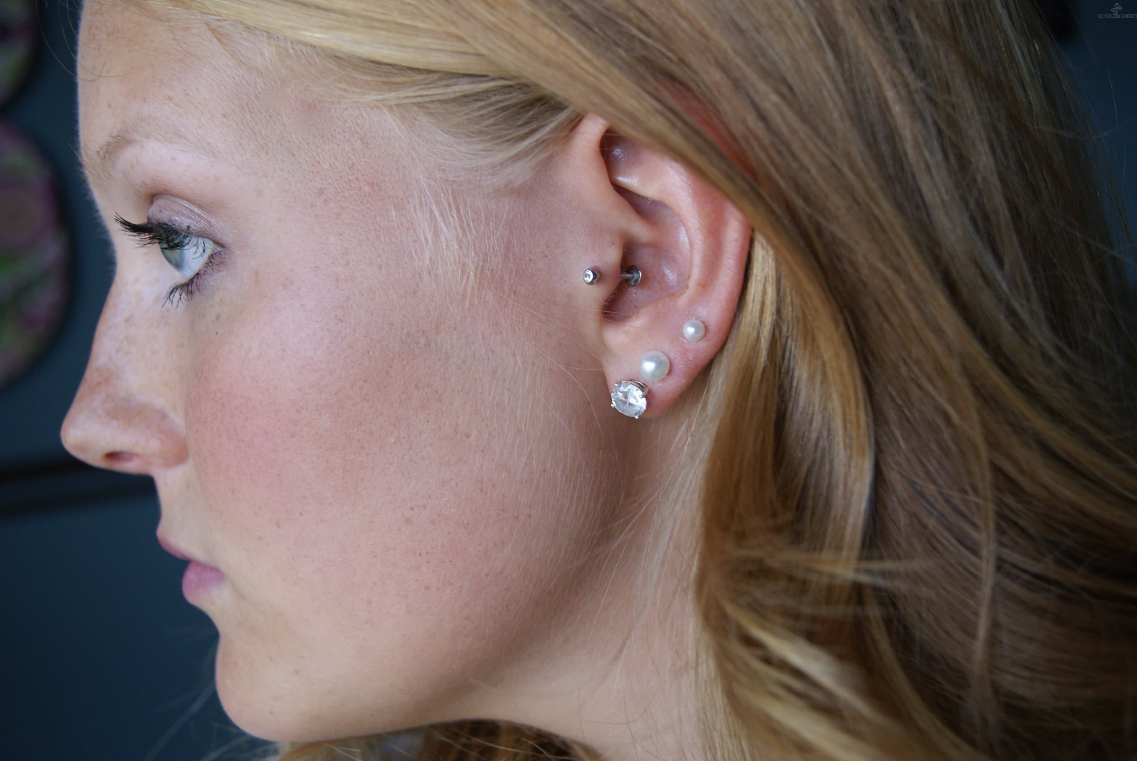 Triple Ear Lobe And Tragus Piercing Picture
