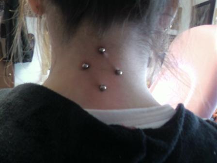 Two Silver Barbells Back Neck Piercing Picture