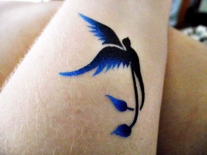 Unique Black And Blue Phoenix Tattoo Design