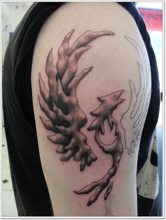 Unique Black Ink Phoenix Tattoo On Man Right Shoulder