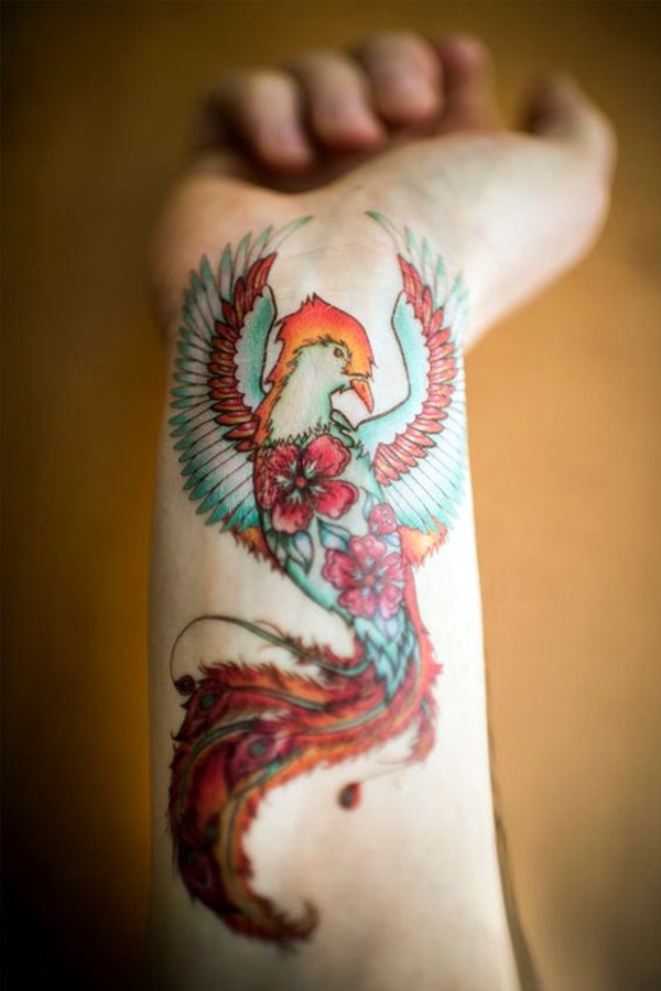 Unique Colorful Phoenix Tattoo On Right Wrist By Marie Massolin