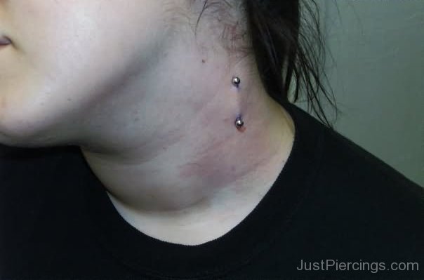 Vertical Surface Barbell Side Neck Piercing