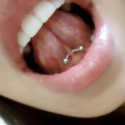 Webbing Piercing With Silver Barbell For Girls