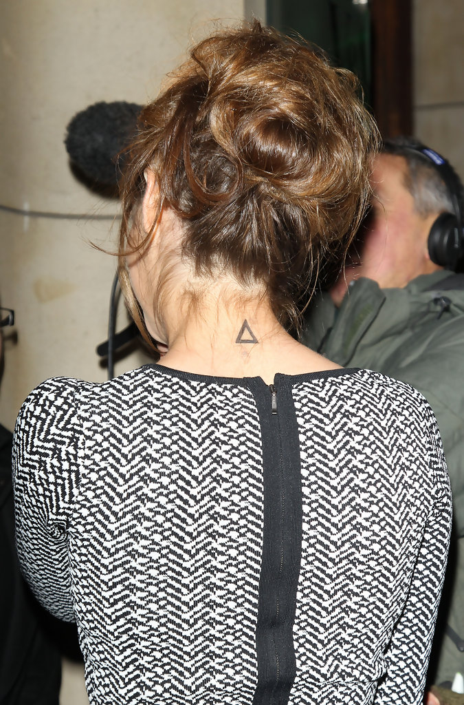Wonderful Black Outline Triangle Tattoo On Girl Back Neck