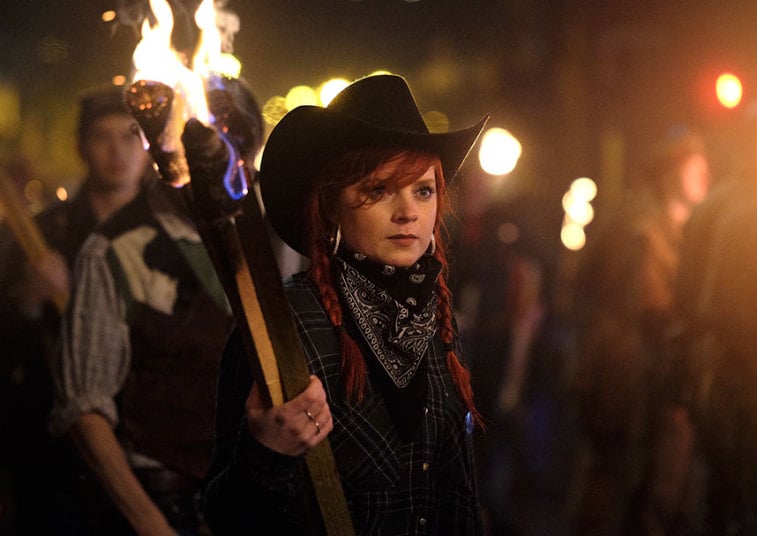 A Girl Holding A Flaming Torches During Guy Fawkes Parade