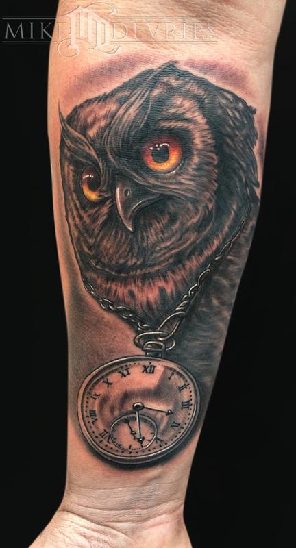 Amazing 3D Owl Head With Clock Tattoo On Right Forearm