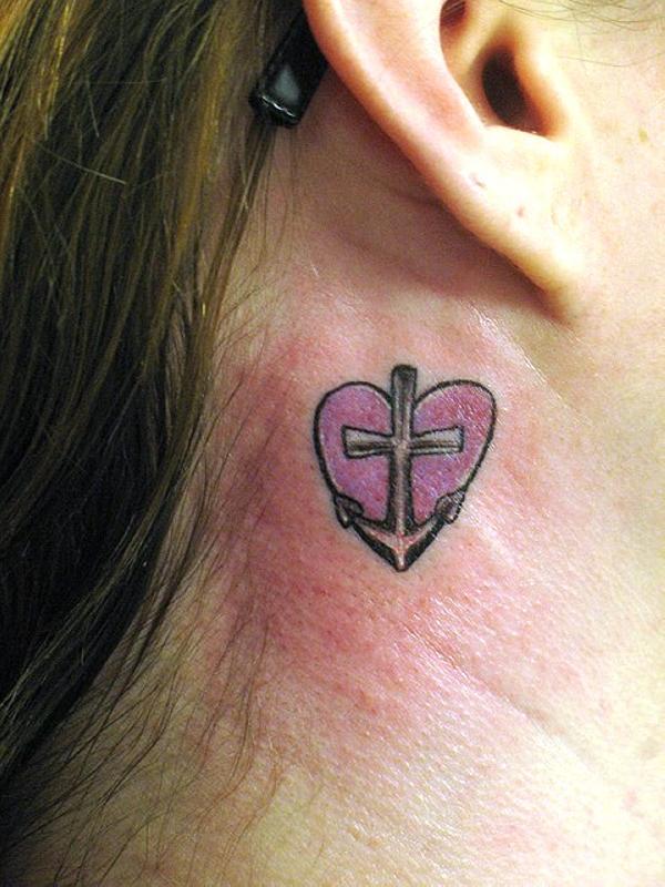 Anchor Cross With Heart Tattoo On Girl Right Behind The Ear