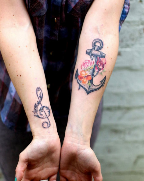 Anchor With Flowers Tattoo On Left Forearm