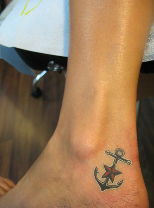 Attractive Anchor With Nautical Star Tattoo On Left Heel