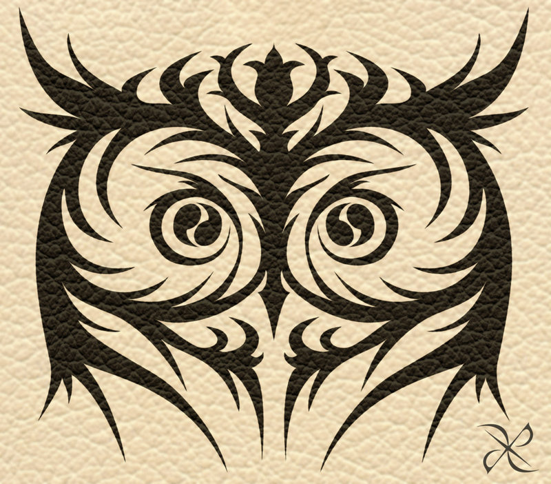 Attractive Black Tribal Owl Head Tattoo Design
