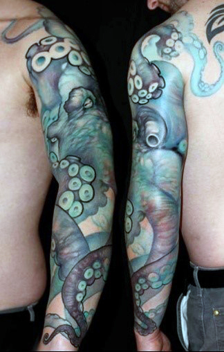 Attractive Octopus Tattoo On Man Left Full Sleeve
