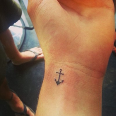 Attractive Simple Black Anchor Tattoo On Left Wrist