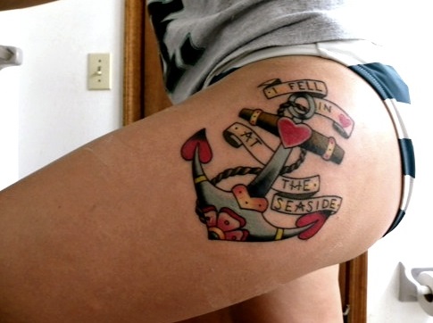 Attractive Traditional Anchor With Banner Tattoo On Girl Left Hip