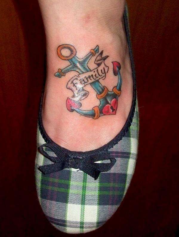 Attractive Traditional Anchor With Banner Tattoo On Left Foot
