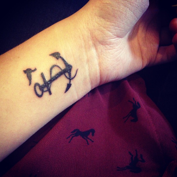 Awesome Black Ink Anchor With Flying Bird Tattoo On Left Wrist